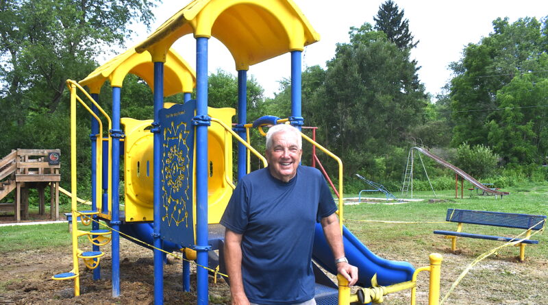 Great-grandson of Hanoverton park's namesake helps install new playground equipment